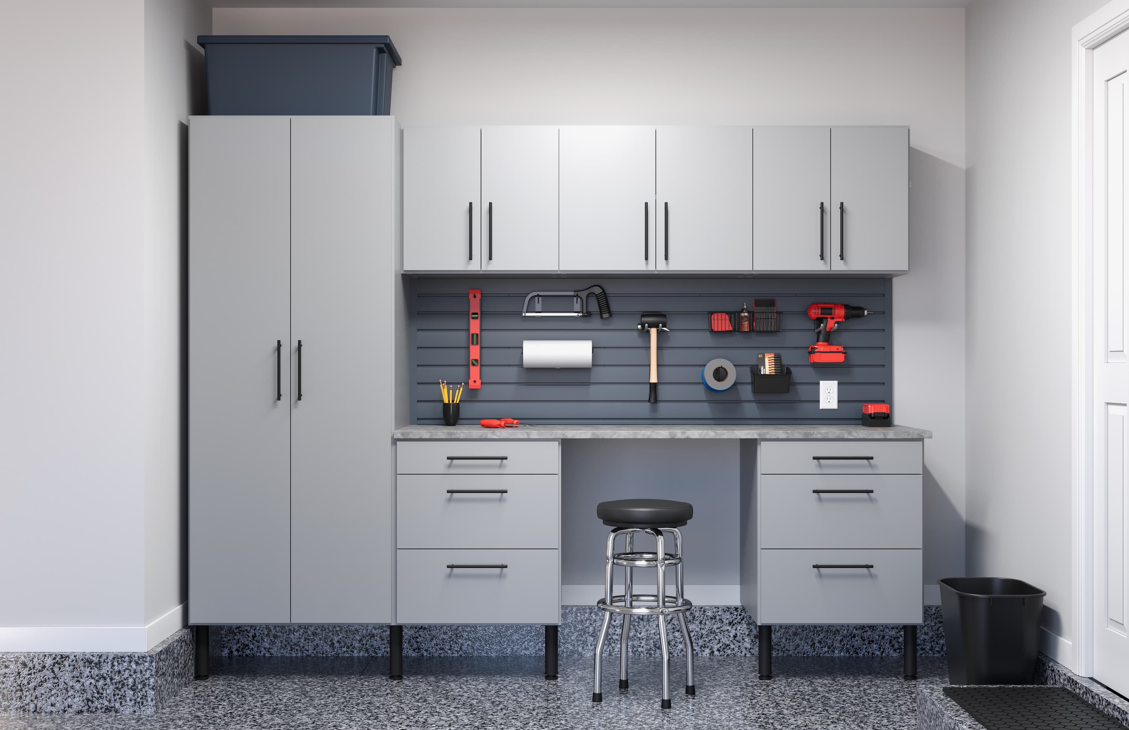 Garage workbench with slatwall accessories and a countertop