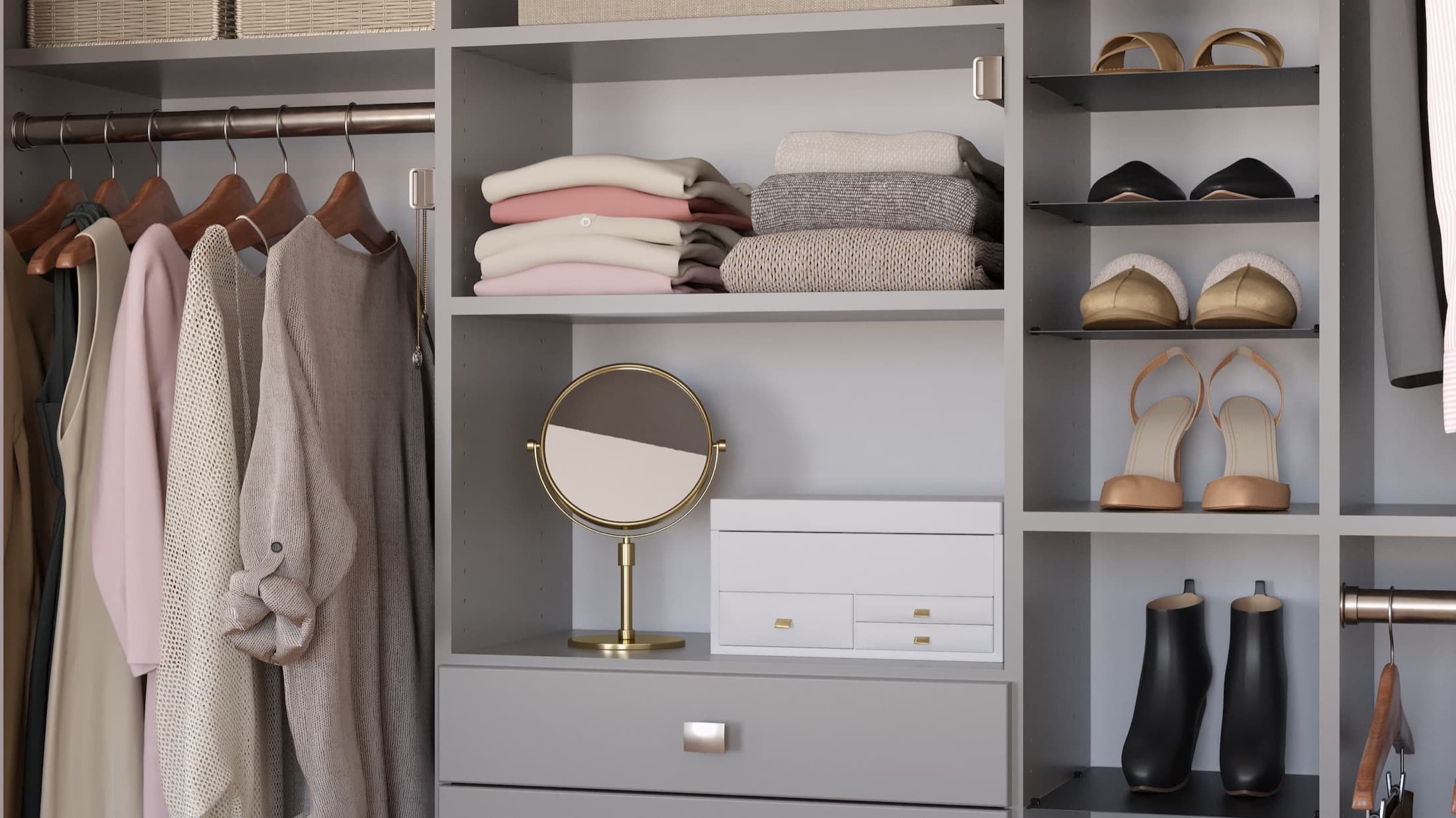 Wide custom reach-in closet system in a light neutral finish