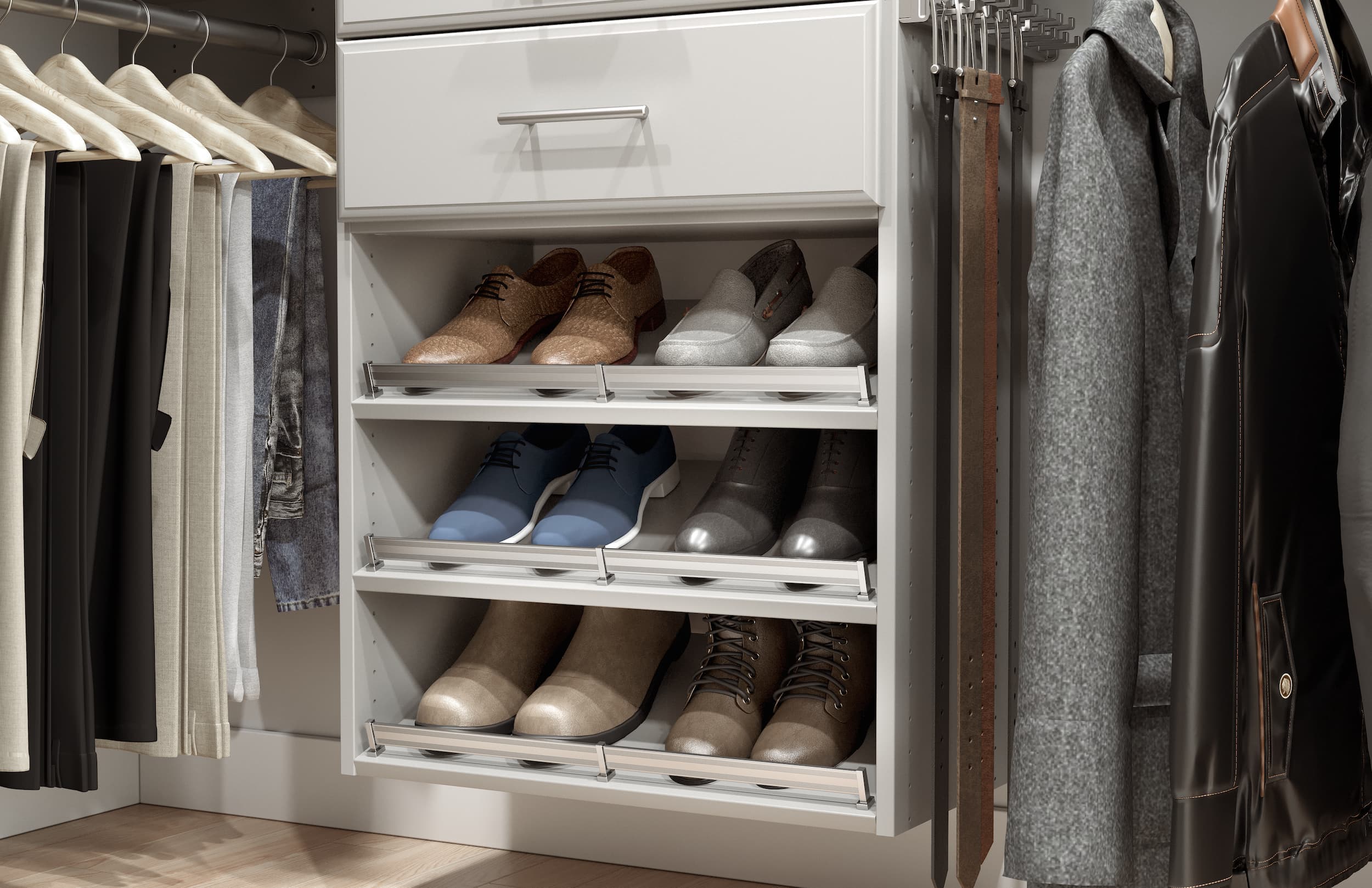 Close-up of custom walk-in shoe shelves, drawers, and a pull-out belt rack