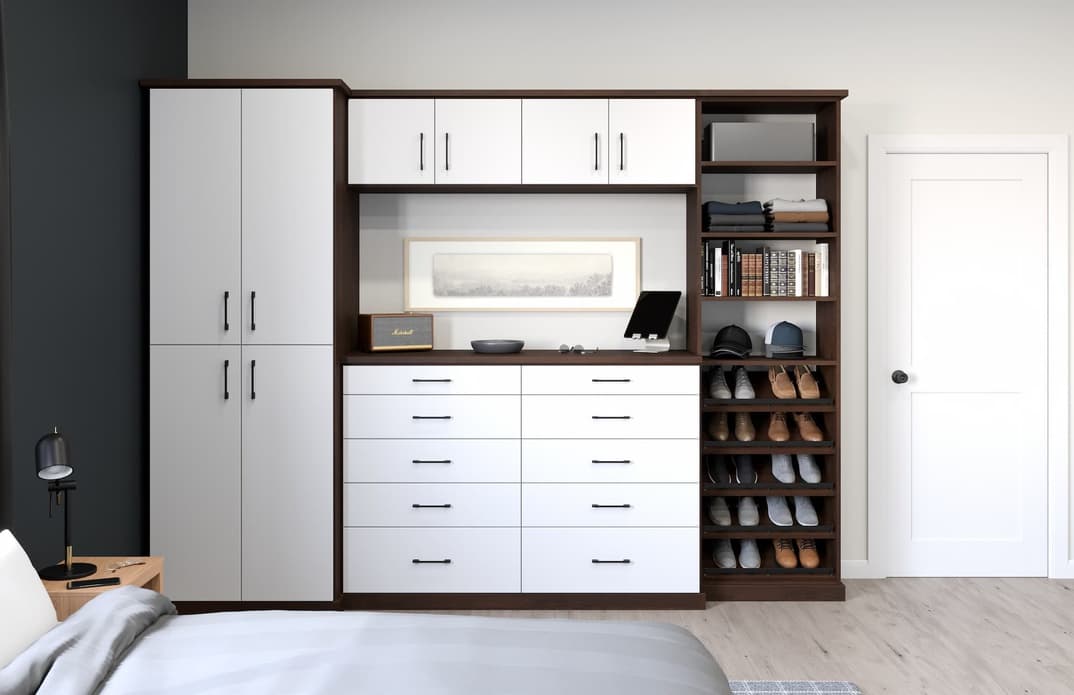 Front view of a custom wardrobe with cabinets, drawers, and shoe shelves
